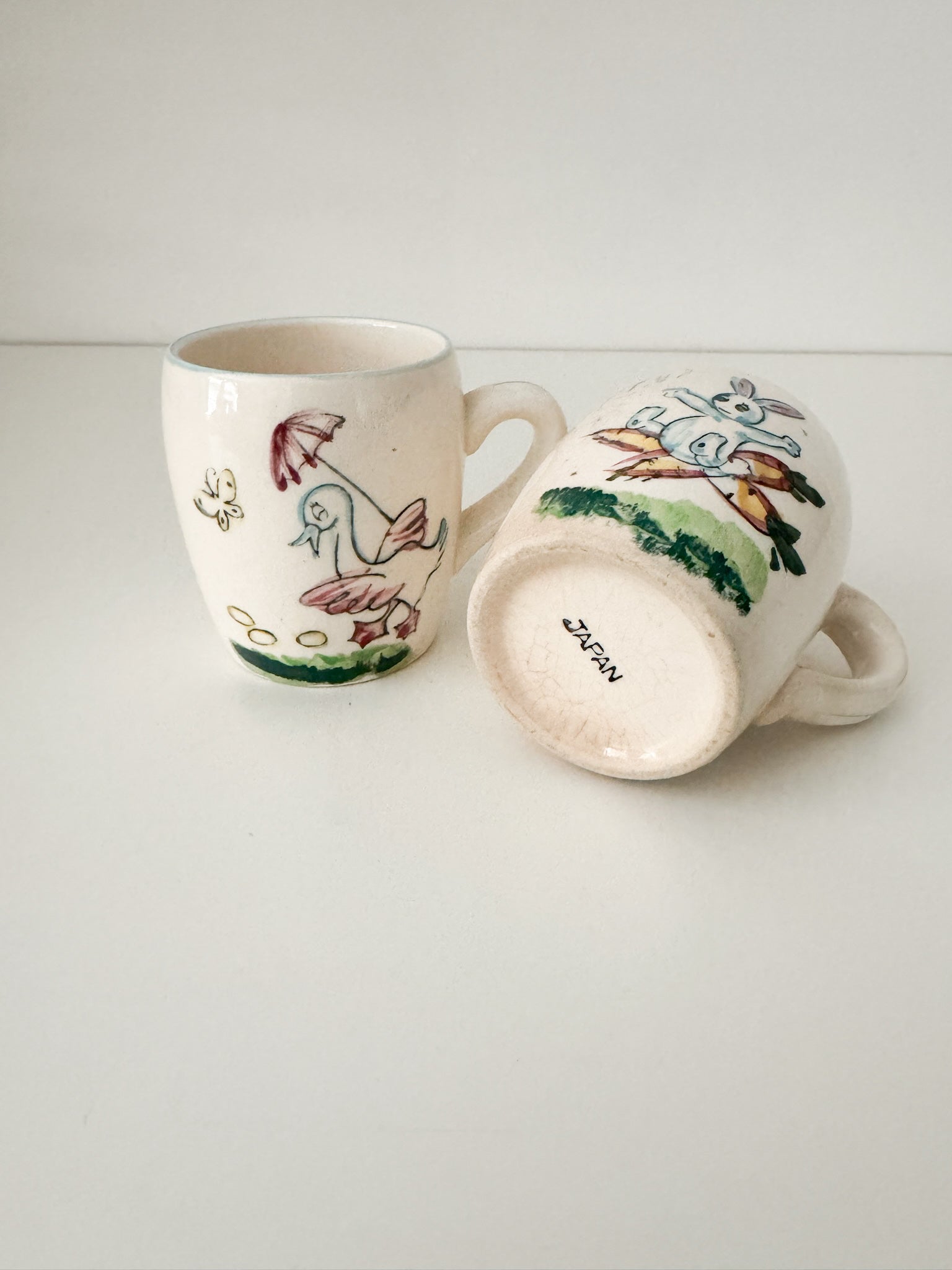 Pair of Vintage Ceramic Children's Mugs